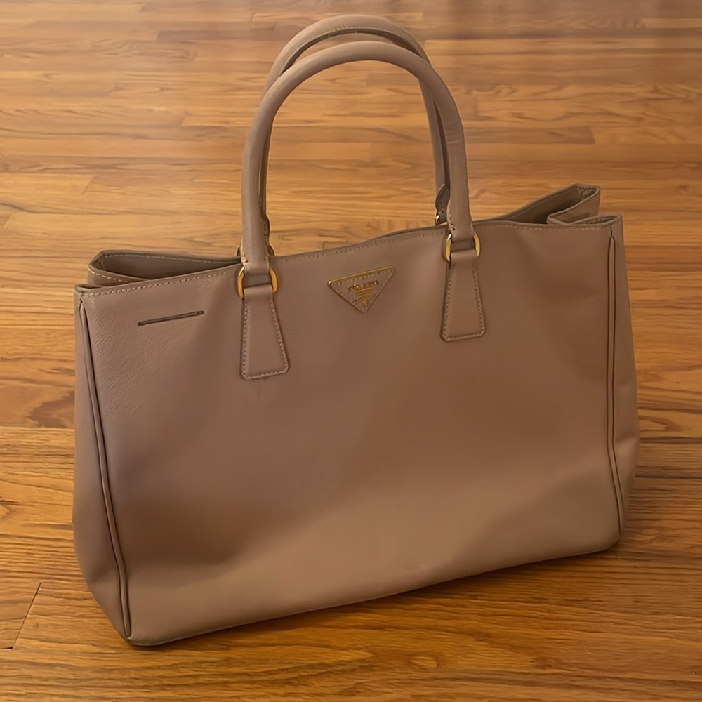 PRADA tote authenticated by Poshmark. Used.